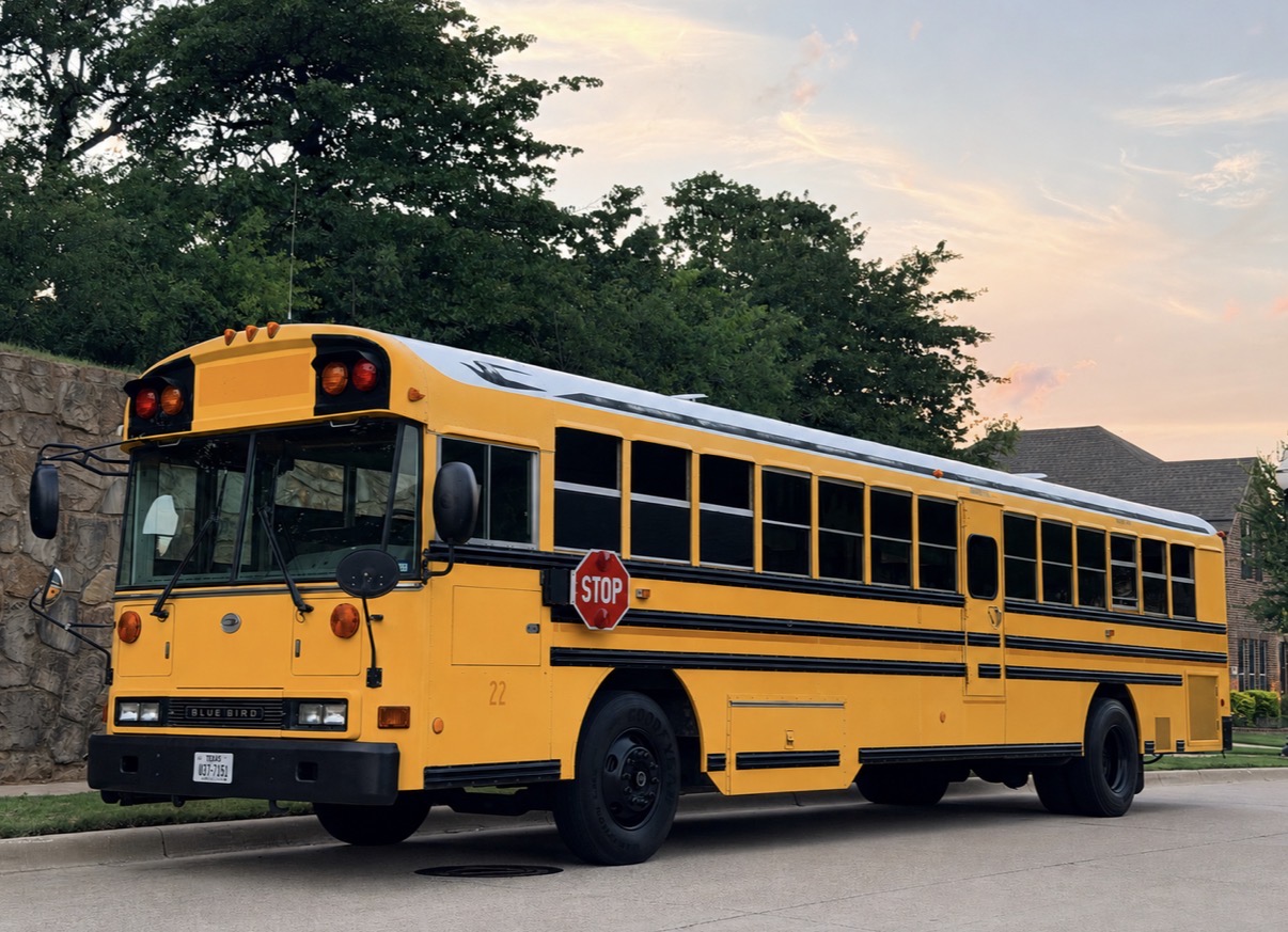 Full side view of the Rolling Transportation Discovery Blue Bird school bus